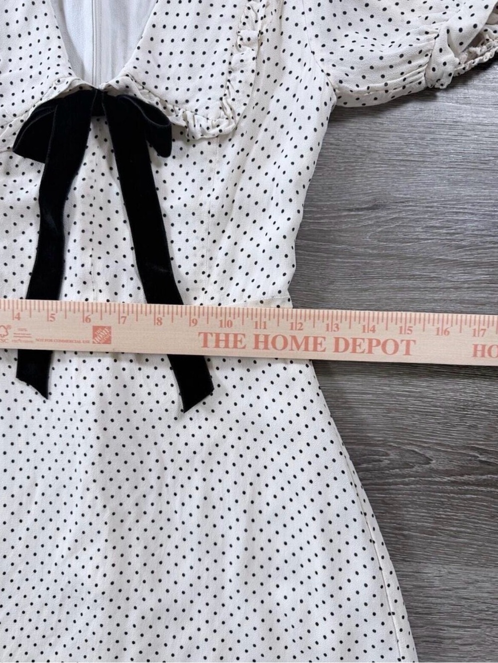 Reformation Kaylia Polka Dot Mini Dress in cream with a black bow - Picture 7 of 9